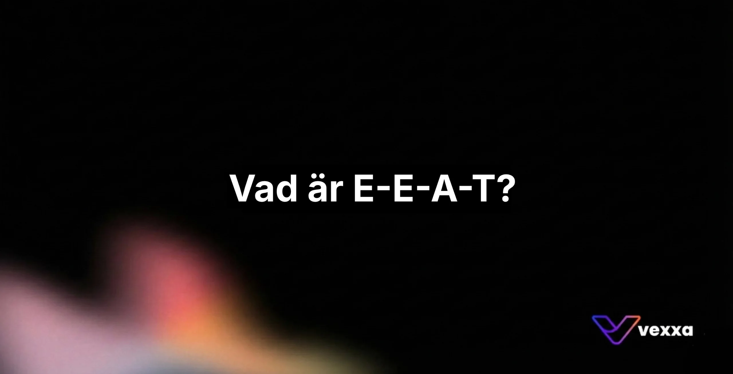 Vit text i mitten av en svart bakgrund "Vad är E-E-A-T?"